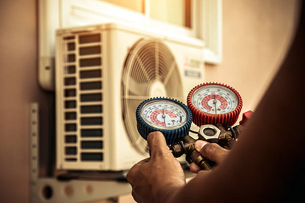 Professional Air Conditioning Service technician working in Clarcona, FL